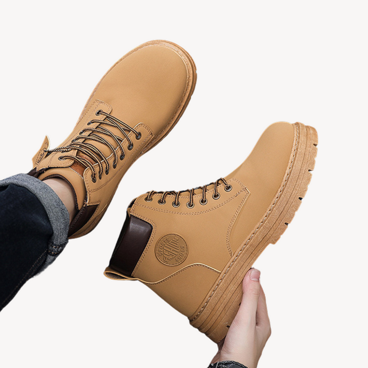 "Brown men's durable leather boots with cushioned insole, rugged sole, lace-up closure, and sleek design; ideal for outdoor u