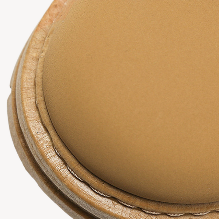 "Brown men's durable leather boots with cushioned insole, rugged sole, lace-up closure, and sleek design; ideal for outdoor u