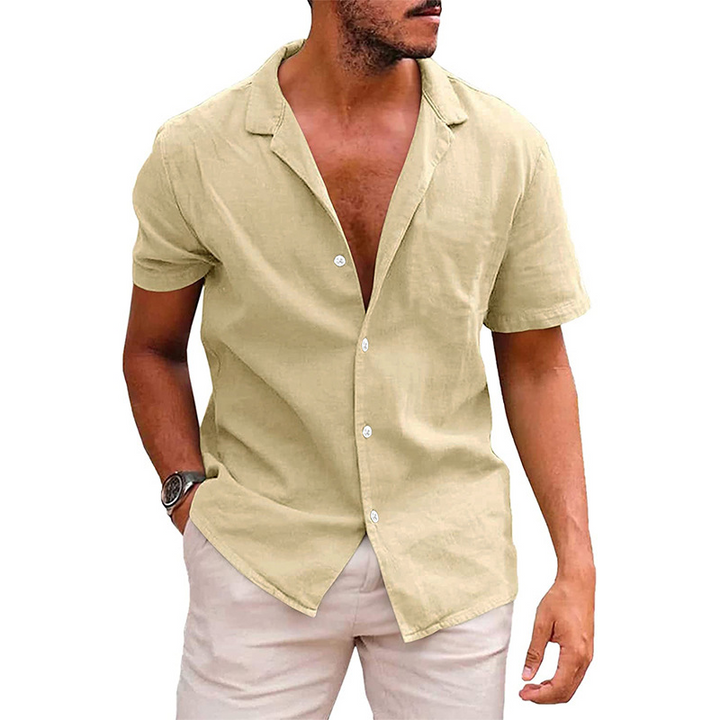 "Casual men's short-sleeve button-down shirt with a relaxed fit and open collar in light blue, perfect for summer comfort."