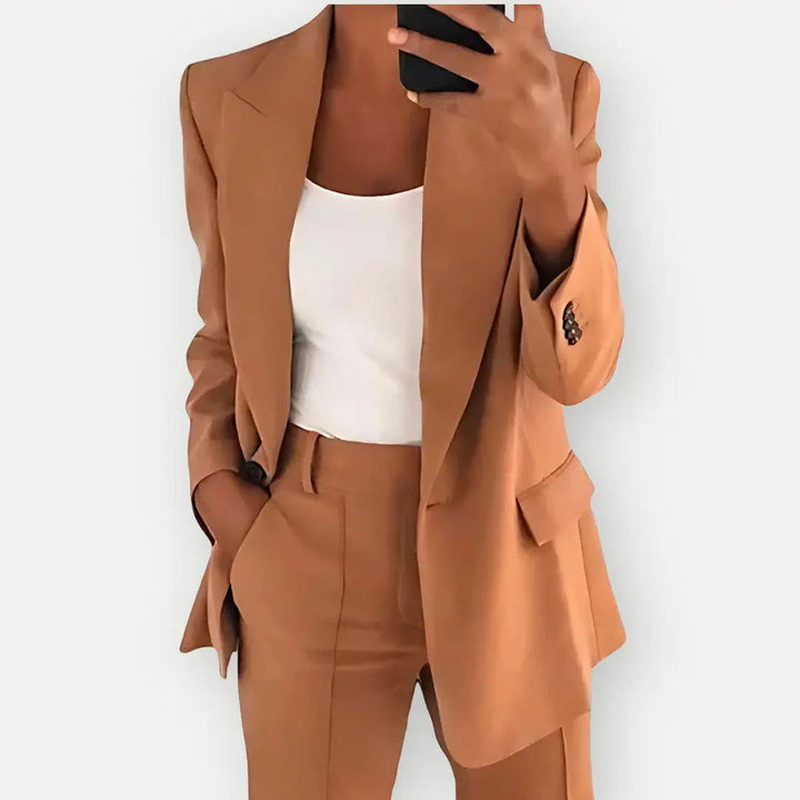 Chic women's tailored blazer and trouser set, elegant business attire with a modern fit, ideal for office or formal events.