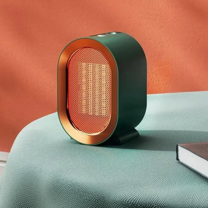 Compact electric heater with sleek design, available in blue, green, and white, perfect for desk or office use.