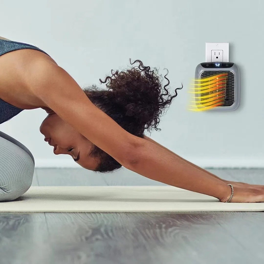 "Compact Mini Electric Radiator 800W, portable ceramic heater, sleek design, perfect for efficient home heating solutions."