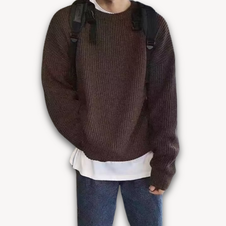 Dark green men's oversized knit sweater, soft acrylic, ribbed texture, cozy winter wear, casual elegance, warm menswear.