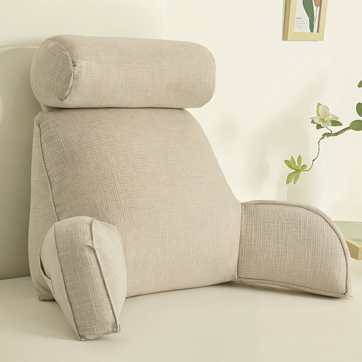 "Deluxe backrest pillow with arms and headrest in cream, featuring a soft-touch finish and side pocket for added convenience.