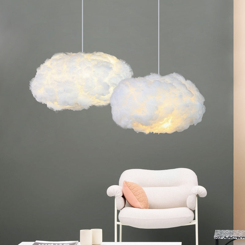 "Dreamy cloud chandelier with soft, fluffy cotton design emits warm, inviting glow for cozy home lighting ambiance."