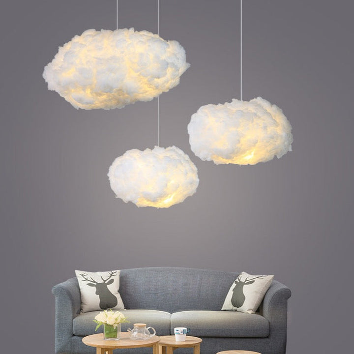 "Dreamy cloud chandelier with soft, fluffy cotton design emits warm, inviting glow for cozy home lighting ambiance."