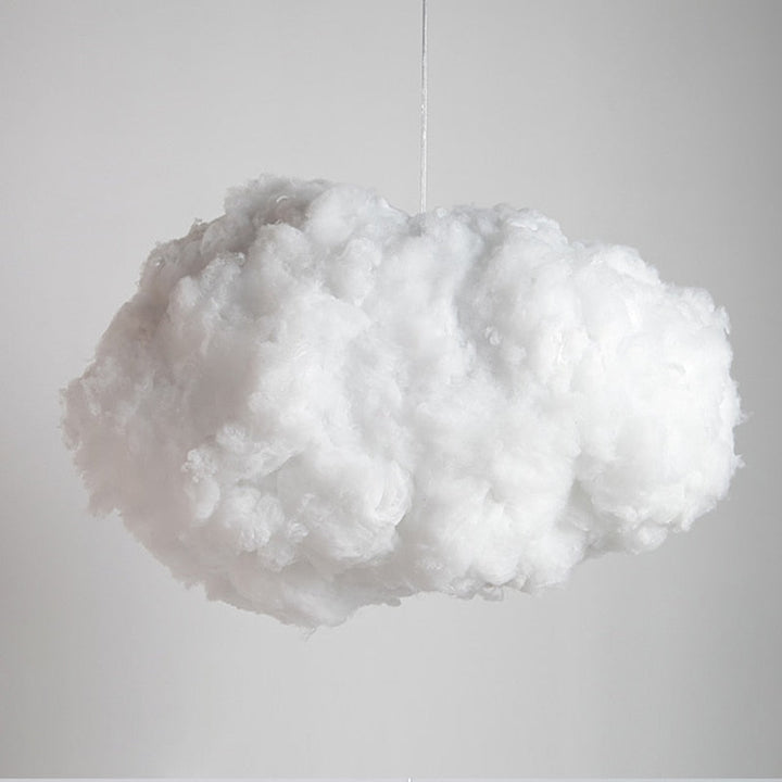 "Dreamy cloud chandelier with soft, fluffy cotton design emits warm, inviting glow for cozy home lighting ambiance."
