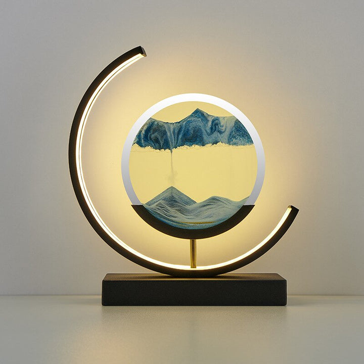 Dynamic Sand Art LED Table Lamp with flowing sandscapes and soft lighting, perfect for home or office decor transformation.