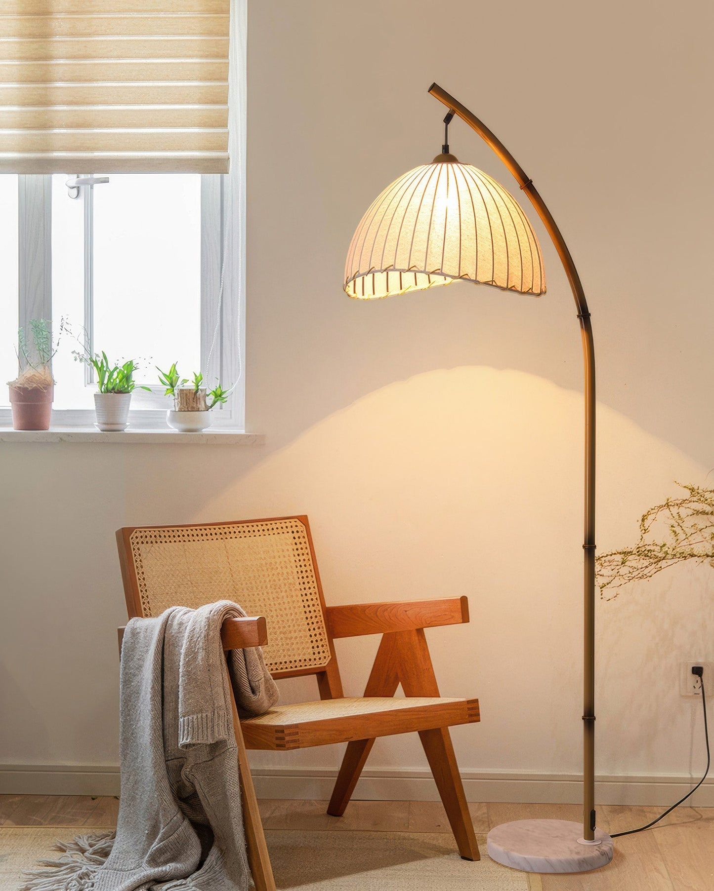 Elegant bamboo floor lamp with fabric shade, offering ambient lighting for a relaxing ambiance in home decor settings.