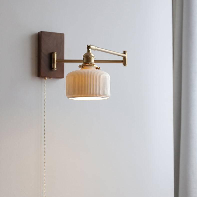 "Elegant ceramic wall lamp with wooden plate, featuring a modern design in cylinder or globe lampshade for stylish interiors.