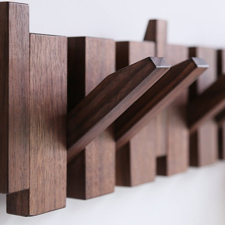 "Elegant handmade wooden piano coatrack front view, showcasing unique piano key design and quality craftsmanship in home deco