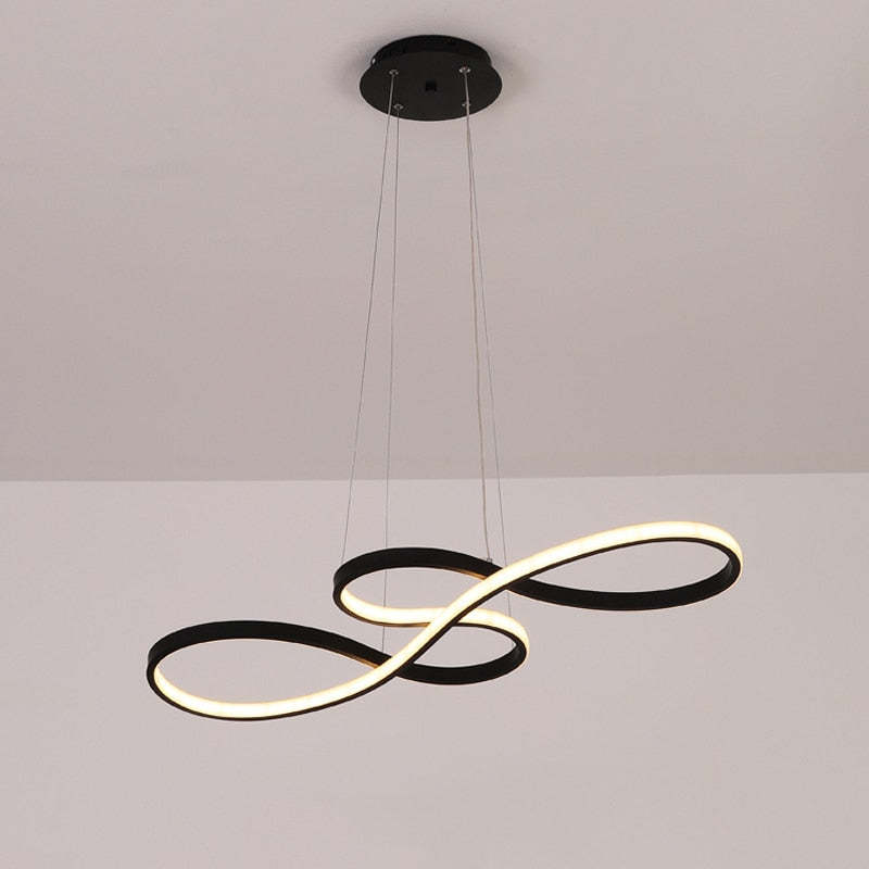 "Elegant LED pendant lamp with musical notes design in metallic black, white, and gold, creating a contemporary aesthetic."