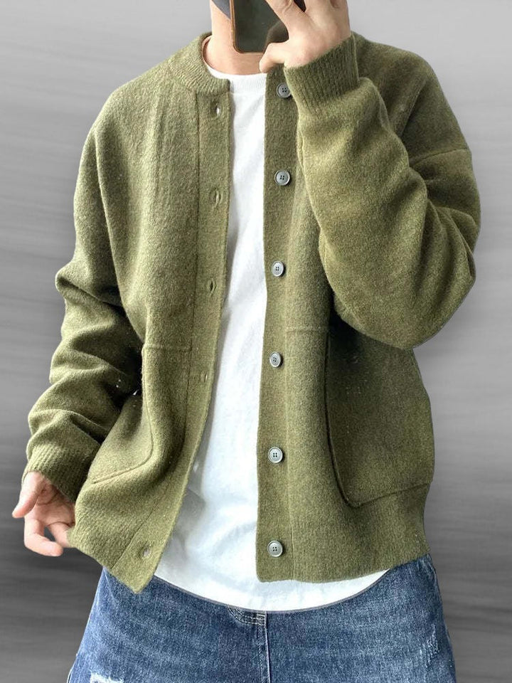 Elegant men's knitted cardigan in beige, showcasing ribbed cuffs and hem, perfect for casual or semi-formal wear.