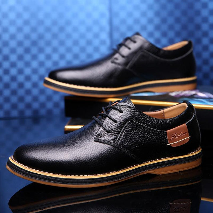 "Elegant men's premium leather Oxford dress shoes, classic formal wear with polished look, ideal for business attire."