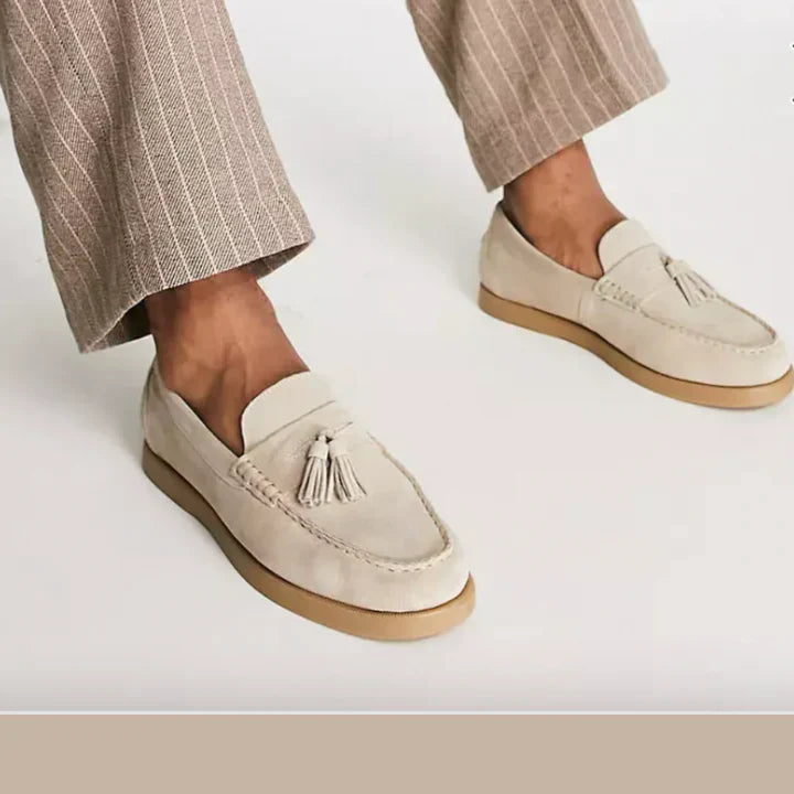Elegant men's suede loafers with non-slip sole; versatile design; perfect for casual and formal wear; luxurious look.