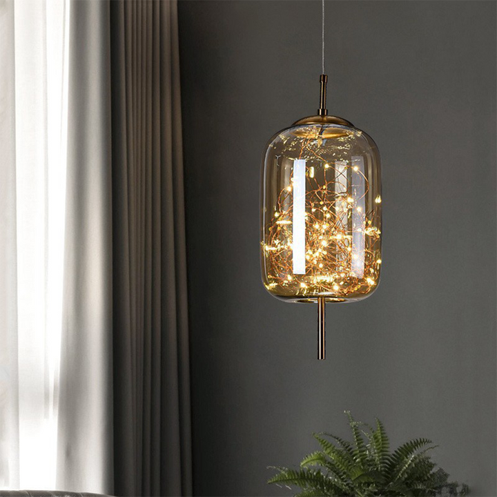 Elegant Scandinavian LED pendant light with sleek glass design; perfect for modern spaces, enhancing ambiance with soft glow.