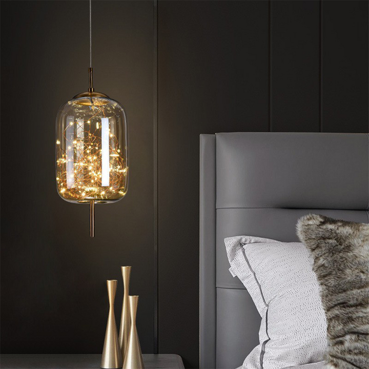 Elegant Scandinavian LED pendant light with sleek glass design; perfect for modern spaces, enhancing ambiance with soft glow.