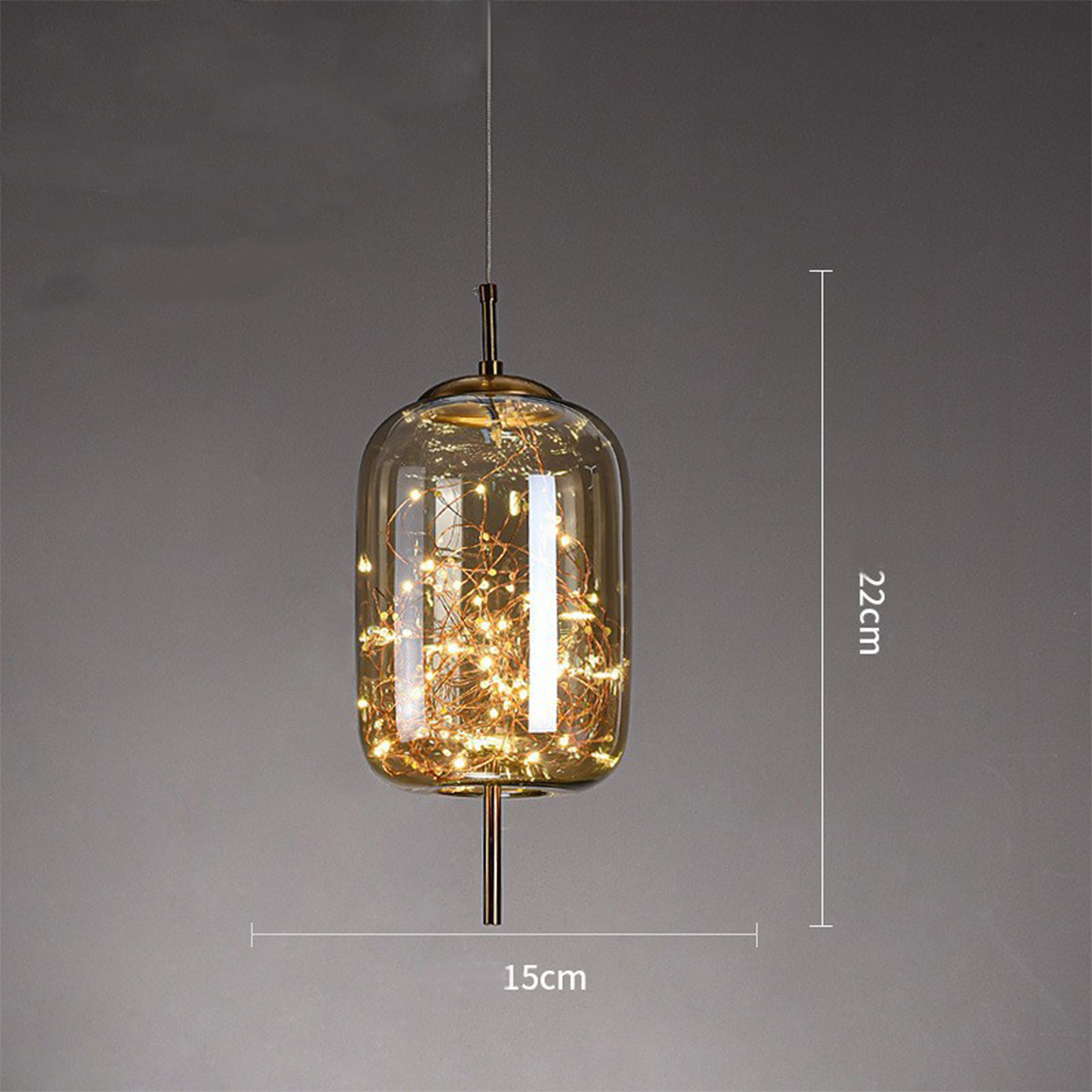 Elegant Scandinavian LED pendant light with sleek glass design; perfect for modern spaces, enhancing ambiance with soft glow.