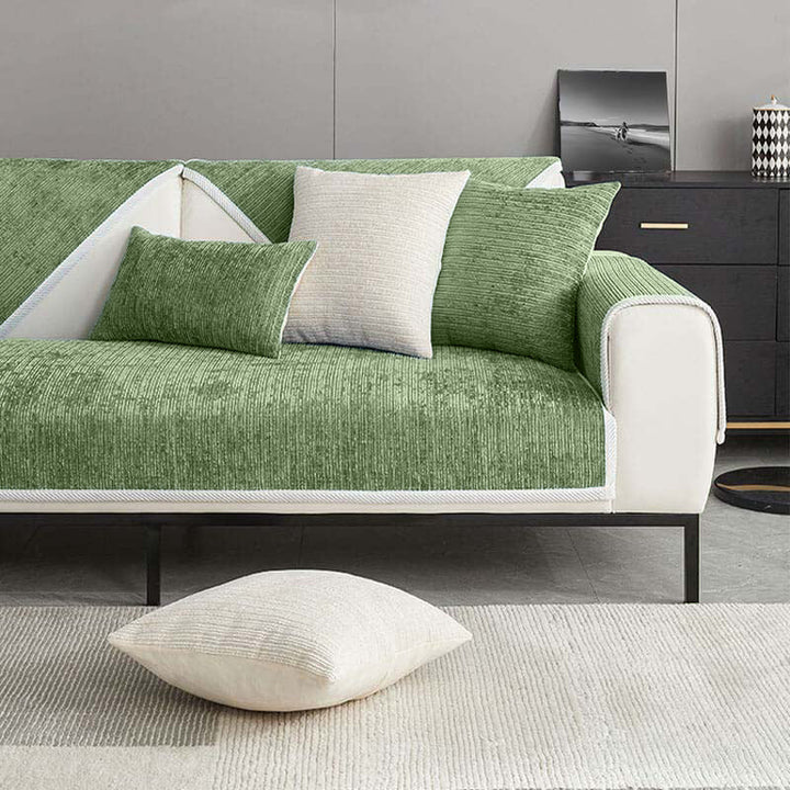 Elegant waterproof chenille sofa cover in soft hues, offering antimicrobial protection and sleek design for home decor.