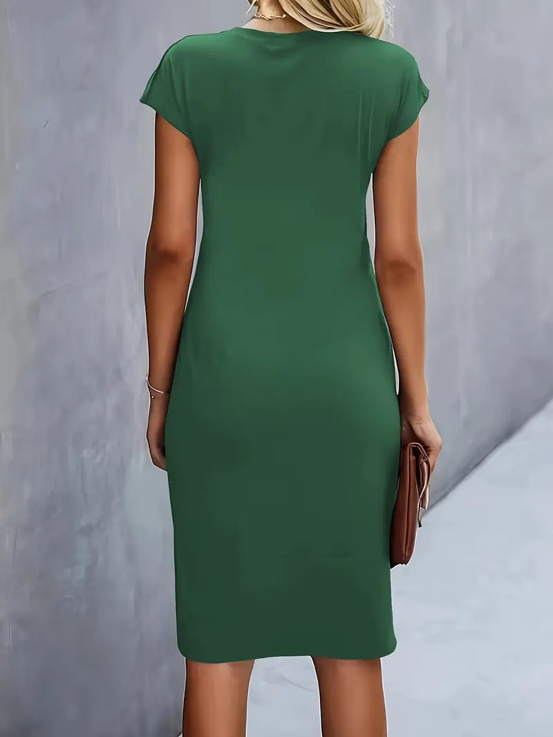 Elegant women's knee-length sheath dress with ruched waist, shown in dark green. Perfect for day-to-night wear.