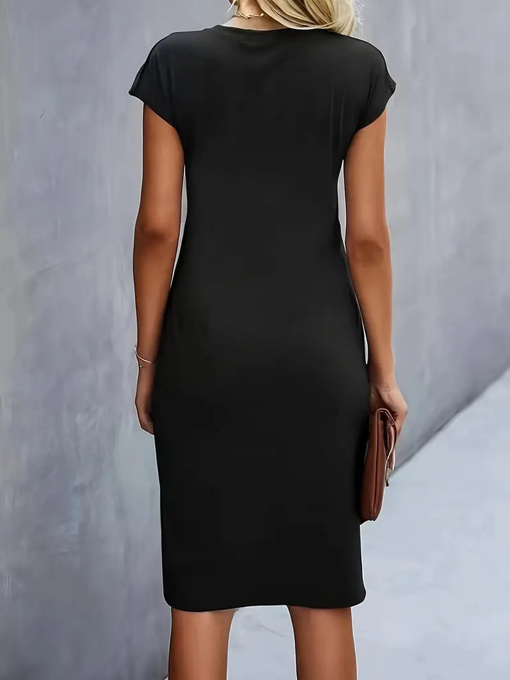 Elegant women's knee-length sheath dress with ruched waist, shown in dark green. Perfect for day-to-night wear.