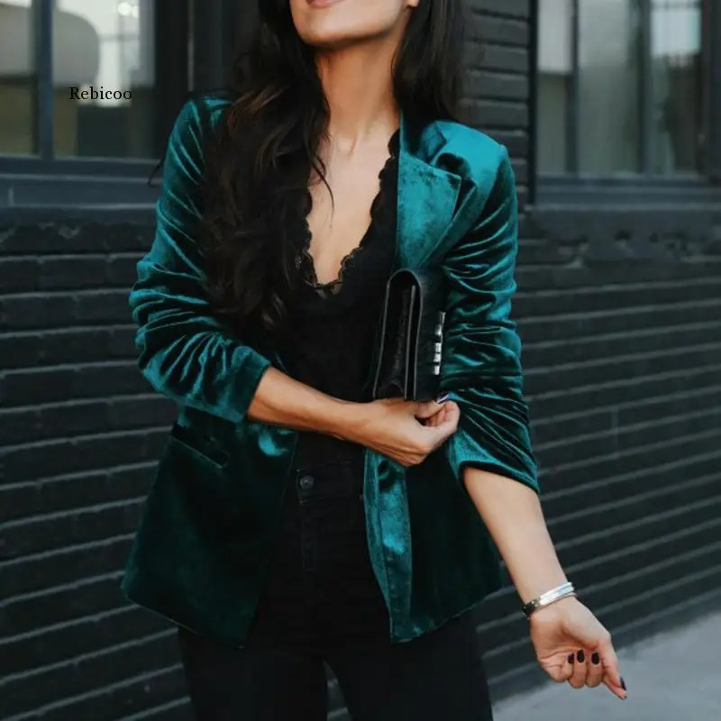 Elegant women's long-sleeved velvet blazer in soft velvet, tailored fit for formal or casual chic outfits.