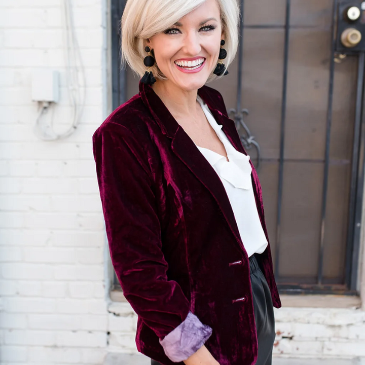 Elegant women's long-sleeved velvet blazer in soft velvet, tailored fit for formal or casual chic outfits.