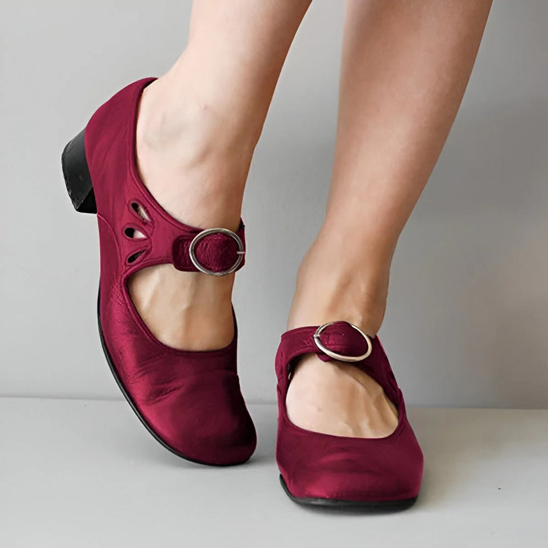 Ergonomic women's orthopedic leather sandals with adjustable straps, designed for comfort and natural foot alignment.