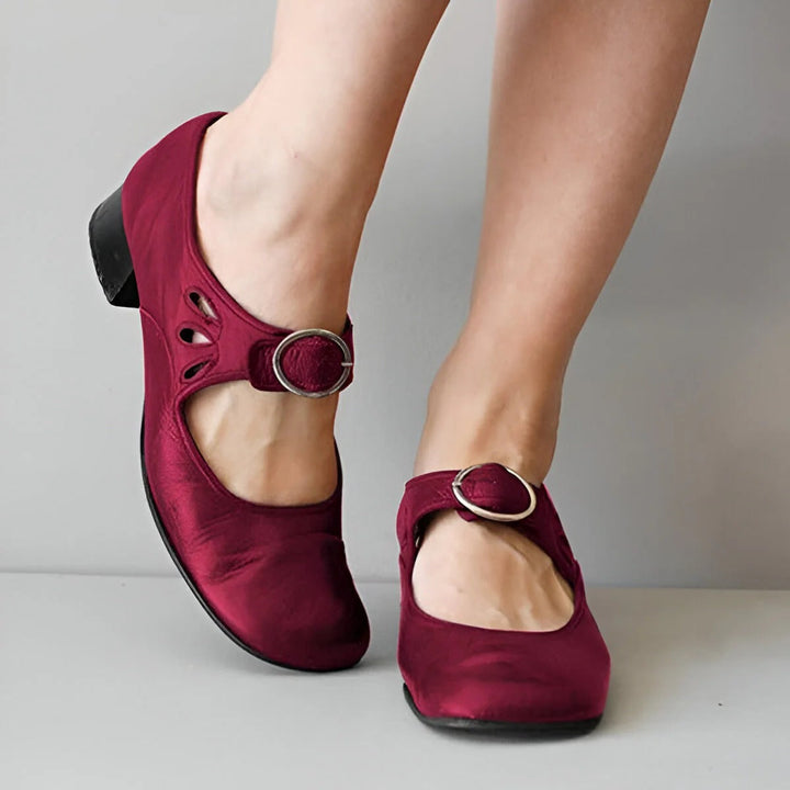 Ergonomic women's orthopedic leather sandals with adjustable straps, designed for comfort and natural foot alignment.