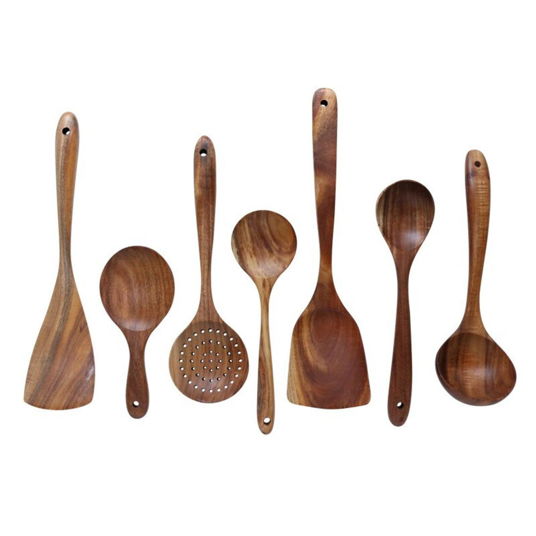 Handcrafted teak wooden cookware set, 7-piece; includes spoons and spatula with unique grain. Perfect for eco-friendly kitche