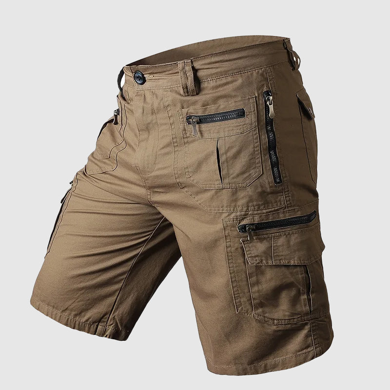 Knee-length men's durable cargo shorts with a rugged look and multiple pockets, ideal for outdoor and casual wear.