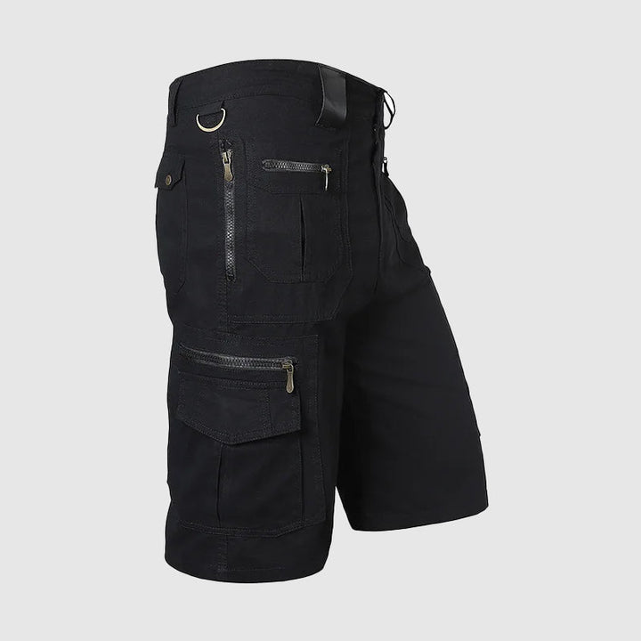 Knee-length men's durable cargo shorts with a rugged look and multiple pockets, ideal for outdoor and casual wear.