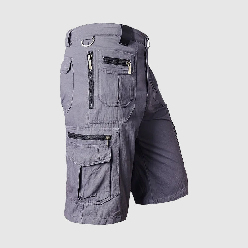 Knee-length men's durable cargo shorts with a rugged look and multiple pockets, ideal for outdoor and casual wear.