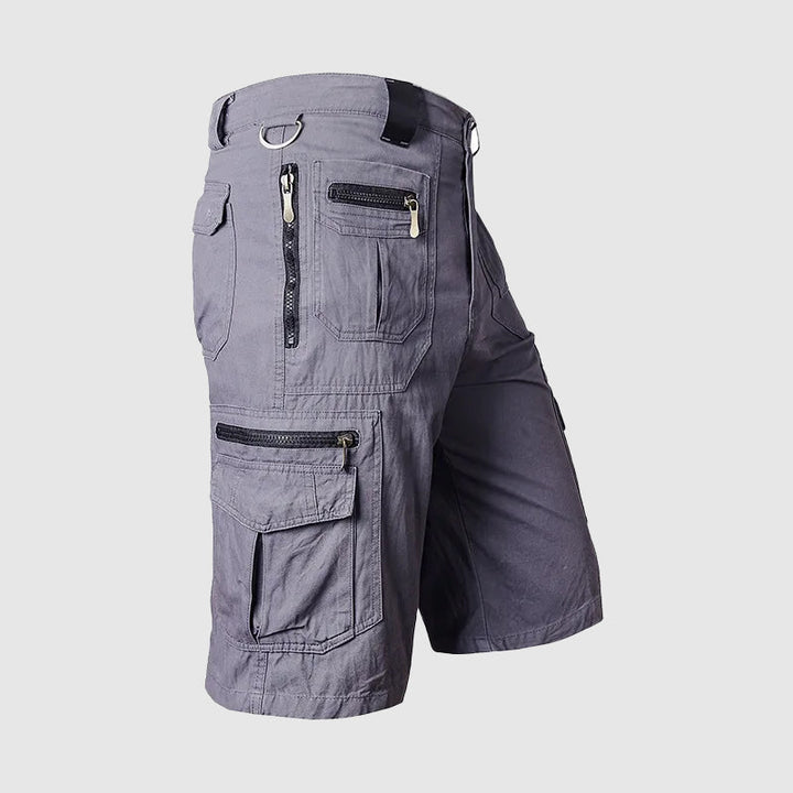 Knee-length men's durable cargo shorts with a rugged look and multiple pockets, ideal for outdoor and casual wear.