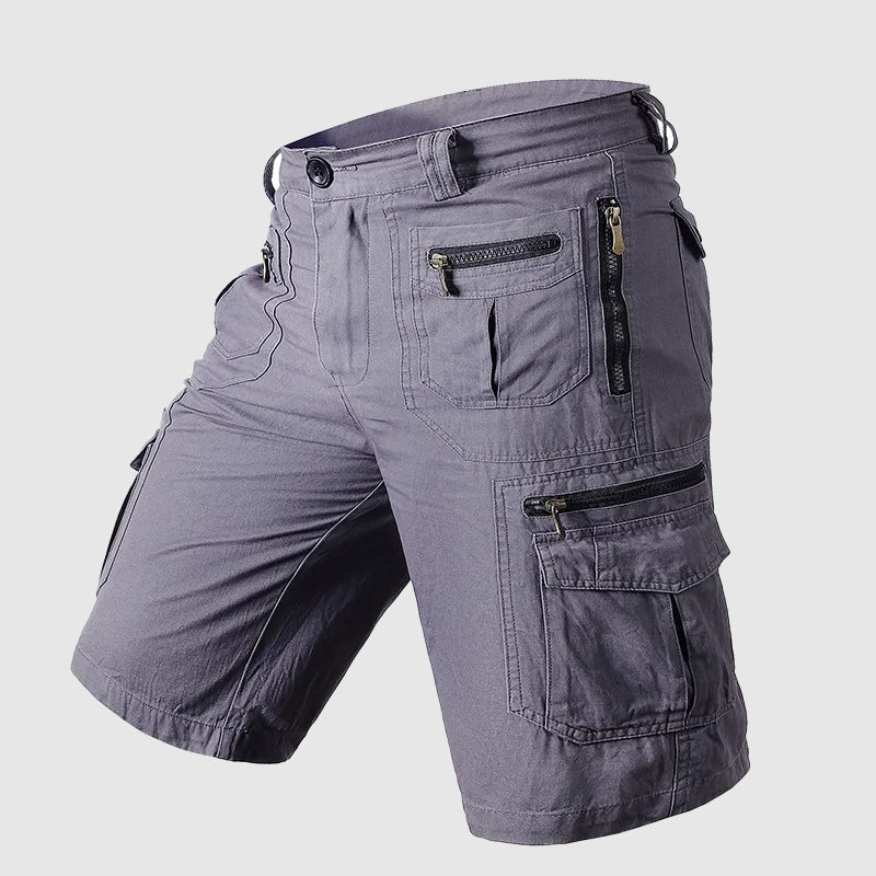 Knee-length men's durable cargo shorts with a rugged look and multiple pockets, ideal for outdoor and casual wear.