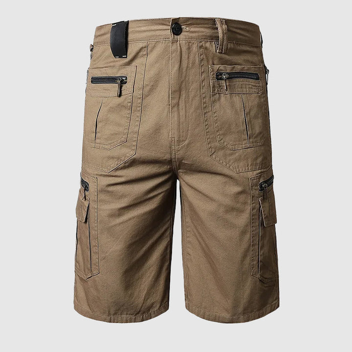 Knee-length men's durable cargo shorts with a rugged look and multiple pockets, ideal for outdoor and casual wear.