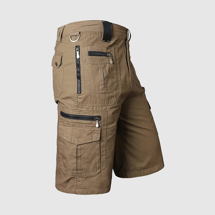 Knee-length men's durable cargo shorts with a rugged look and multiple pockets, ideal for outdoor and casual wear.