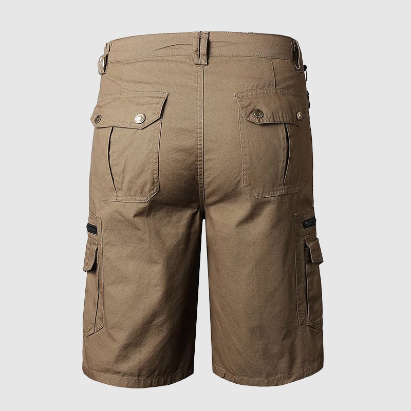 Knee-length men's durable cargo shorts with a rugged look and multiple pockets, ideal for outdoor and casual wear.