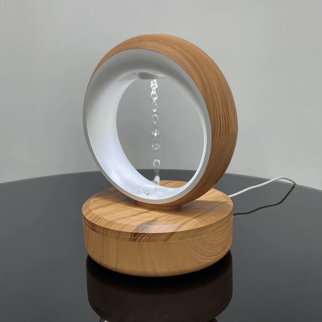 "Levitating Water Droplet Ultrasonic Humidifier with LED light, showing floating droplets effect, perfect for modern decor."