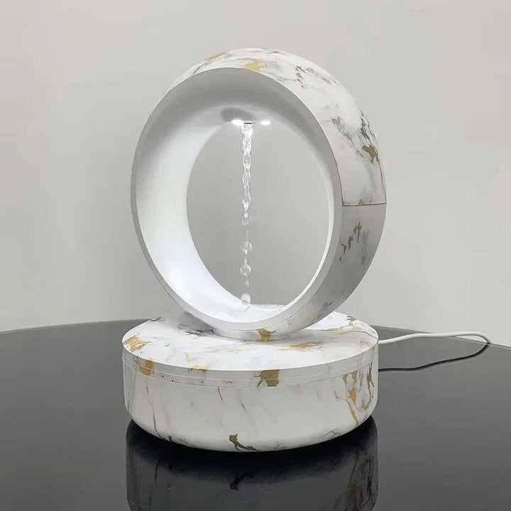 "Levitating Water Droplet Ultrasonic Humidifier with LED light, showing floating droplets effect, perfect for modern decor."