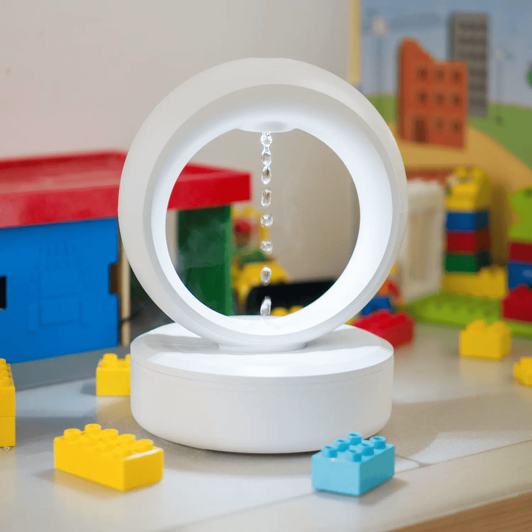 "Levitating Water Droplet Ultrasonic Humidifier with LED light, showing floating droplets effect, perfect for modern decor."