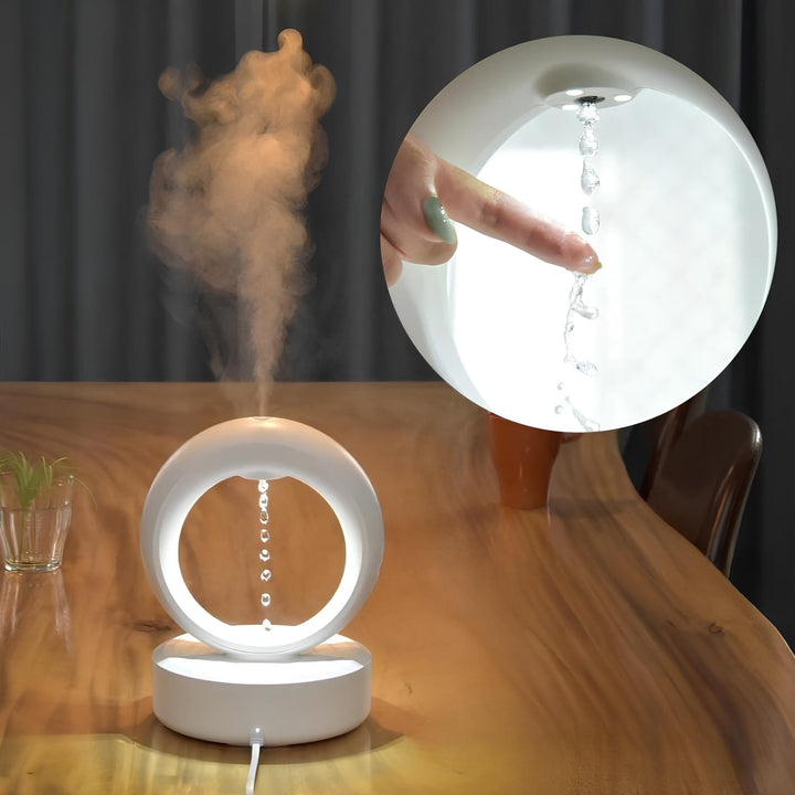 "Levitating Water Droplet Ultrasonic Humidifier with LED light, showing floating droplets effect, perfect for modern decor."