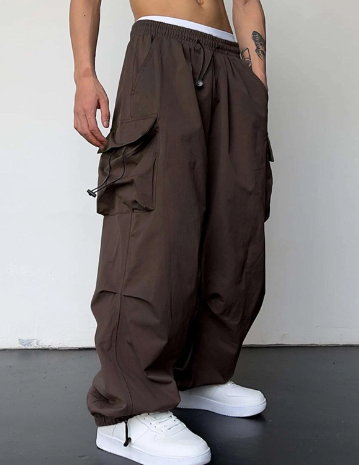 "Men's baggy wide leg cargo pants with large pockets, relaxed fit, durable fabric, perfect for casual style and comfort."