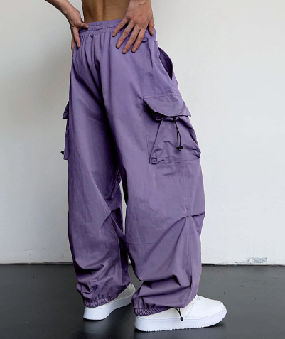 "Men's baggy wide leg cargo pants with large pockets, relaxed fit, durable fabric, perfect for casual style and comfort."