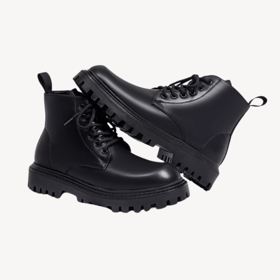 "Men's black leather combat boots with chunky sole, front view, showcasing rugged durability and modern style in premium mate