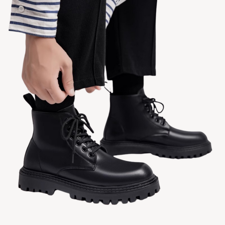 "Men's black leather combat boots with chunky sole, front view, showcasing rugged durability and modern style in premium mate