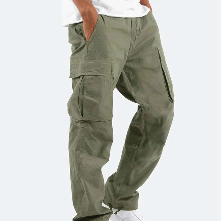 Men's cargo pants with stretch fabric, multiple pockets; comfortable fit, durable with zipper, button closure in khaki color.