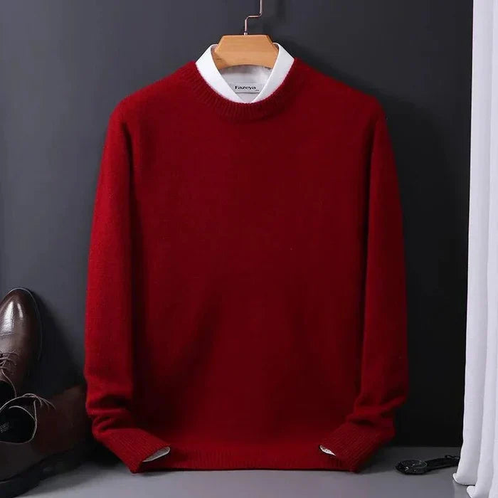 "Men's cashmere loose sweater, soft grey hue, relaxed fit, ribbed finishes, perfect for versatile autumn-winter style."