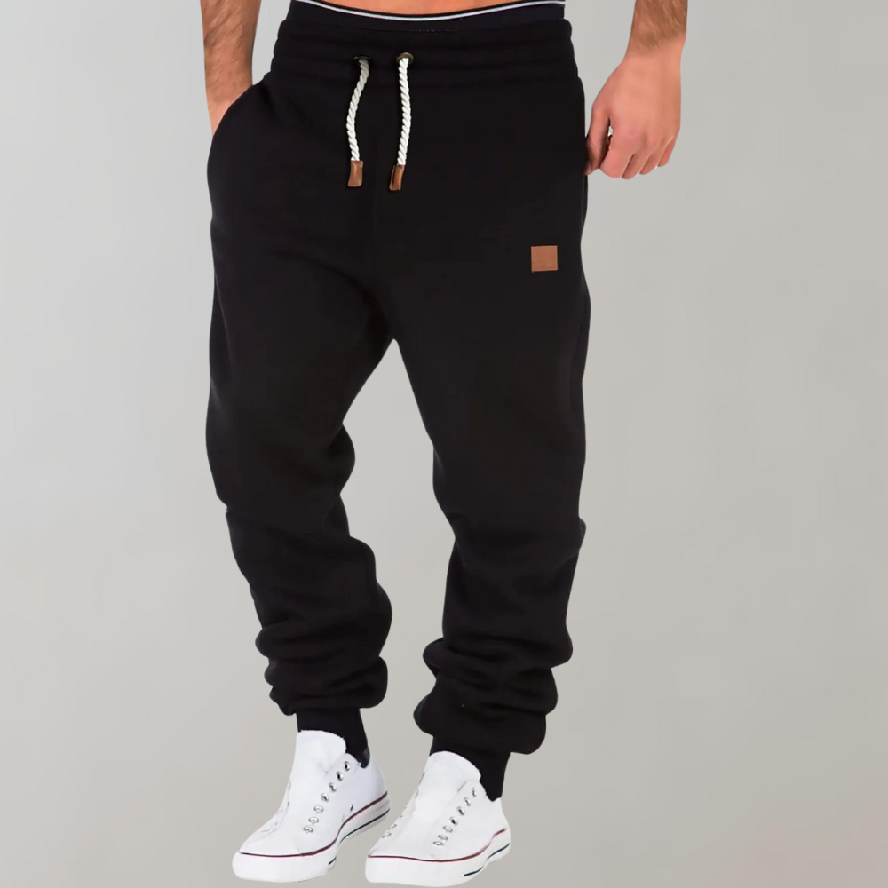 Men's Casual Jogging Pants, relaxed fit, various colors including Black, Blue, Green. Ideal for gym or casual style.