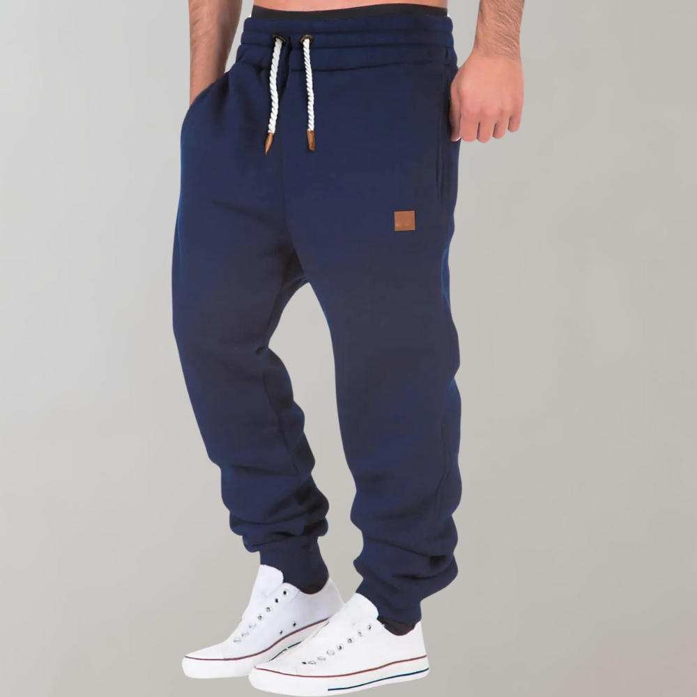 Men's Casual Jogging Pants, relaxed fit, various colors including Black, Blue, Green. Ideal for gym or casual style.